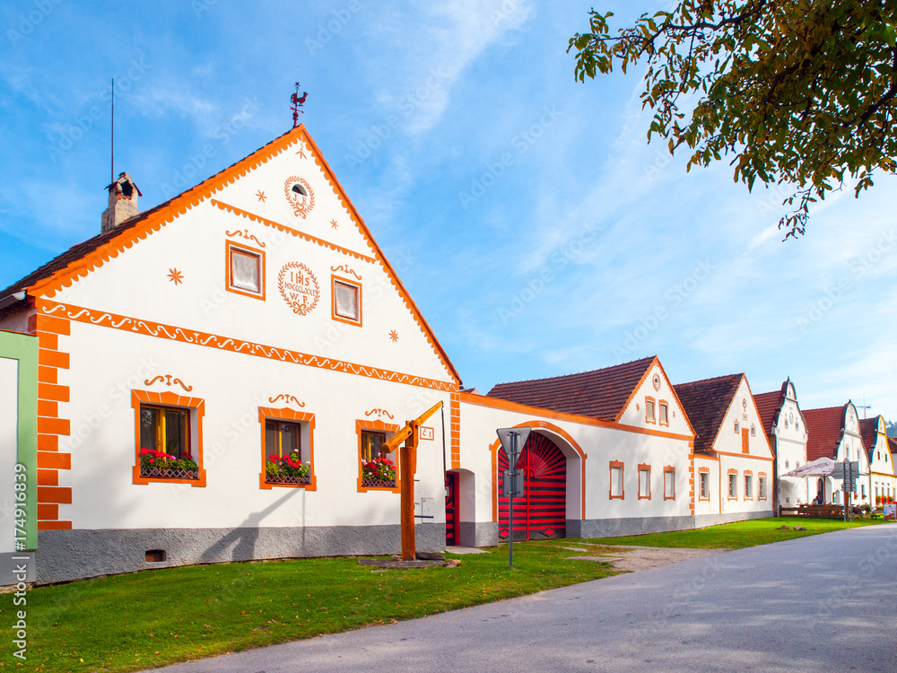 Wall mural picturesque houses of holasovice, small rural village with rustic baroque architecture. southern boh