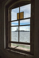 Statue of liberty view from ellis island abandoned psychiatric hospital