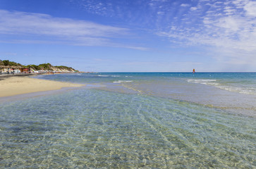 Summertime. The most beautiful sand beaches of Apulia: Alimini bay,Salento coast. Italy (Lecce). It...