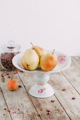 Souvenirs made of porcelain shot in the Studio with marshmallows and flowers. DIY and gift sets