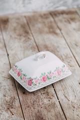 Souvenirs made of porcelain shot in the Studio with marshmallows and flowers. DIY and gift sets