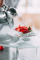 the preparation of the dessert Pavlova with strawberries and in the supply of liquid nitrogen