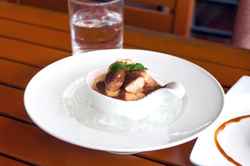 delicious tiramisu dessert on a porcelain plate