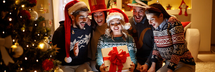 Group of Friends with Christmas gift