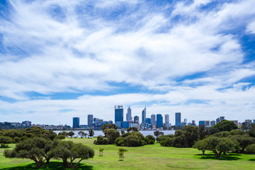 The Perth city skyline viewed across Sir Jame Mitchell Park in South Perth, Western Australia.