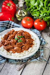 Chicken tikka masala served with rice
