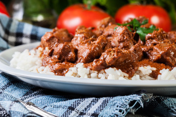 Chicken tikka masala served with rice