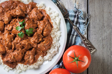 Chicken tikka masala served with rice