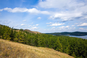 summer landscape, pines, lake and mountains, clouds in the sky, Bashkiria, Ural,  Russia, Lake Kalkan