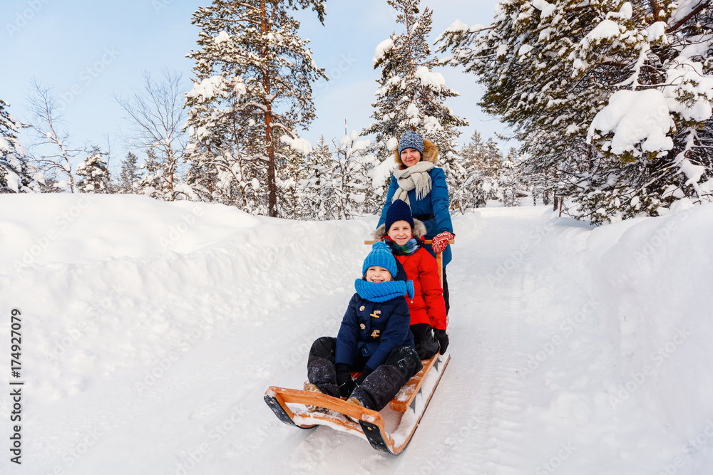 Canvas Prints Mother and kids outdoors on winter