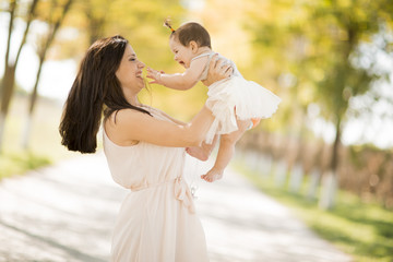 Young woman with baby girl