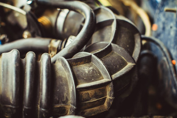 A close up shot of car engine hoses