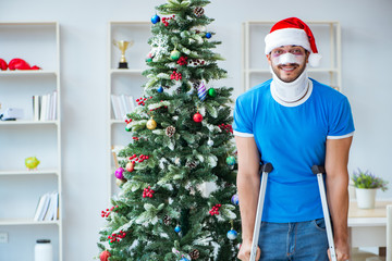Injured man celebrating christmas at home