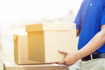 parcel delivery of a package through a service Customer and Pick up autograph sign. hand accepting...