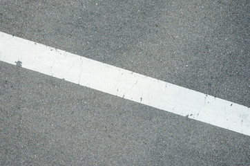 Road Asphalt Texture with Diagonal White Stripe Mark