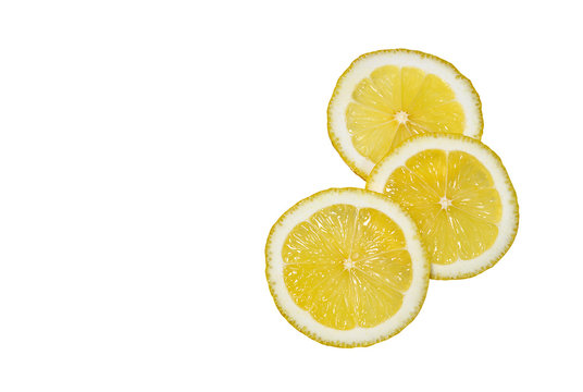 Several lemon slices on a white background