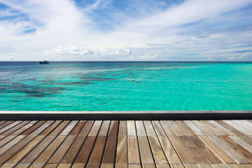 Wood plank with sea and sky background. Maiton island, Phuket, Thailand.
