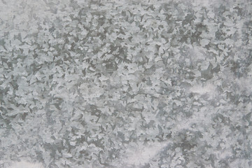 Abstract background, texture, gray with white patterns, metal, closeup