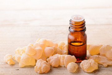 Frankincense essential oil on the table