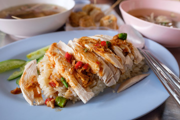 Hainanese chicken rice or "Khao Man Kai" , Thai food.