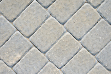 The Texture of the Gray Paving Stone from Artificial Stones. Gray Sidewalk Texture