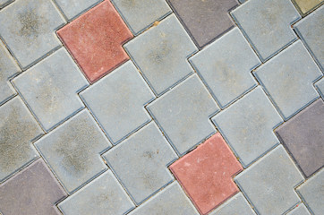 Multicolored Sidewalk Tile Texture. The Texture of Artificial Stone Pavers of Different Colors