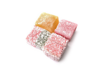 Multi-colored Turkish delight isolated on white background