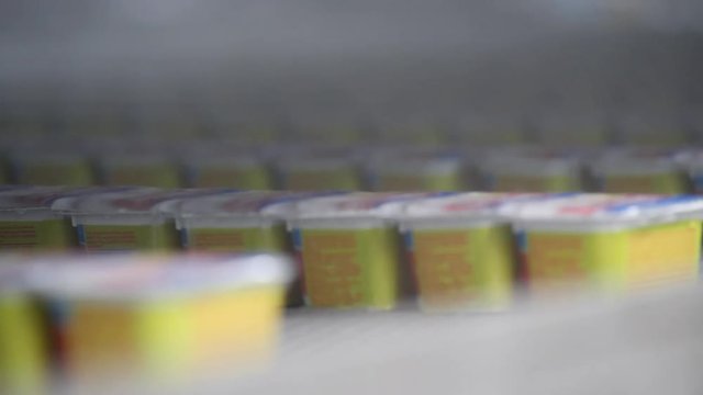 Cooling down proccess of packed and sealed cheese spread products...