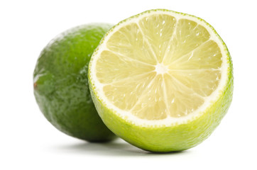 lime and  half of lime isolated on white background