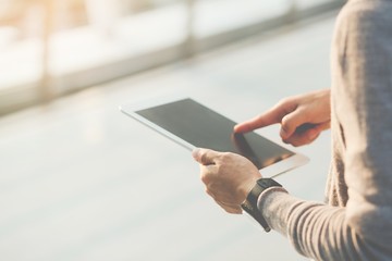 close up of Young Man lifestyle living using tablet. 