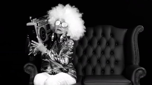 an amazing grandma DJ, older lady with a ghettoblaster