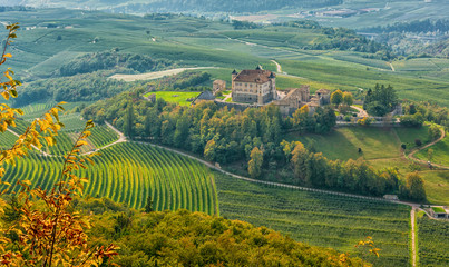 Naklejka premium autumnal landscape of Castel Thun, located in the commune of Ton in the lower Val di Non, Trentino Alto Adige, Italy