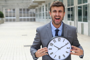 Slammed worker holding the time 