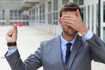 Playing darts with your eyes covered 