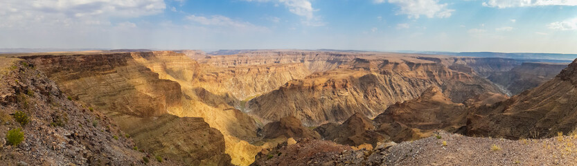Fototapeta na wymiar Panorama of beautiful Fish River Canyon in the south of Namibia, Southern Africa
