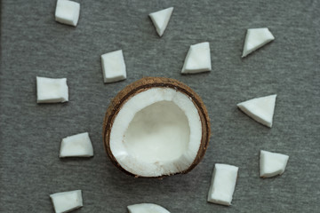 top view fresh half coconut  on a gray background