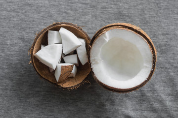 top view fresh half coconut  on a gray background