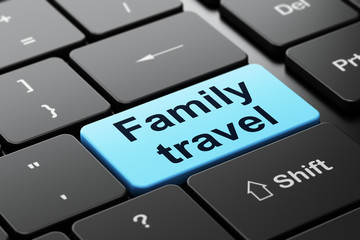 Fototapeta premium Tourism concept: Family Travel on computer keyboard background