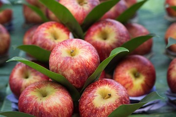 Close up Pile fresh organic red apples from the local farmers market.