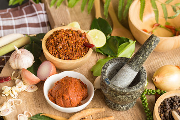 Assortment of Thai food Cooking ingredients. Spices ingredients chilli pepper garlicgalanga and kaffir lime leaves