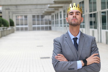 Arrogant businessman with a crown in office space - obrazy, fototapety, plakaty