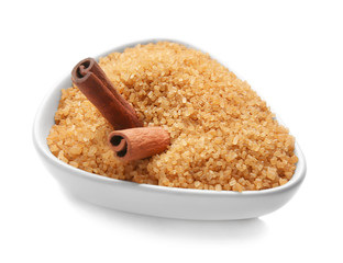 Sweet cinnamon sugar in bowl on white background