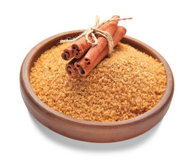 Sweet cinnamon sugar in bowl on white background
