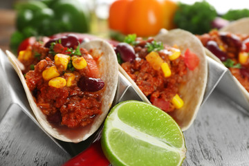 Chili con carne with tortillas on kitchen table