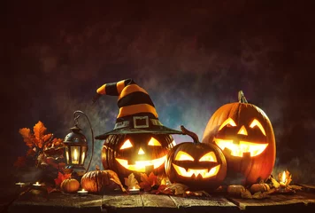 Fotobehang Candle lit Halloween Pumpkins © Alexander Raths