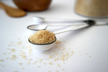 A teaspoon of sugar as an image of baking or cooking preparations