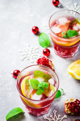 Holiday pomegranate ginger  drink. Selective focus, space for text. 