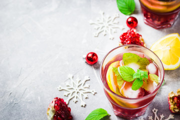 Holiday festive pomegranate drink. Selective focus, space for text. 