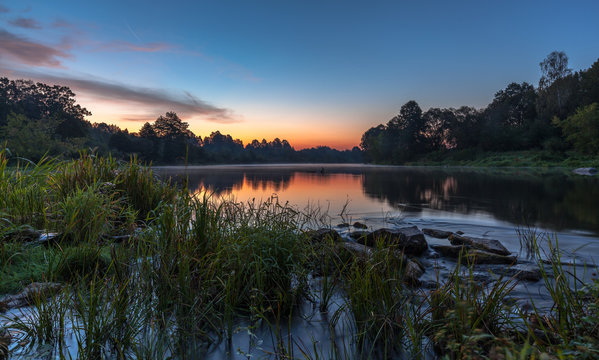 Landscape. Early morning, blue hours. Sunrise on the river. © symbol344