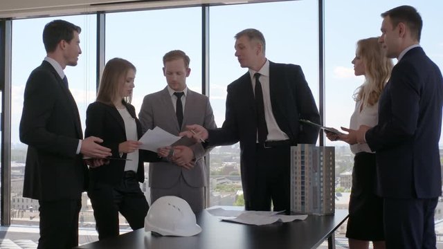 Business meeting of architects and investors